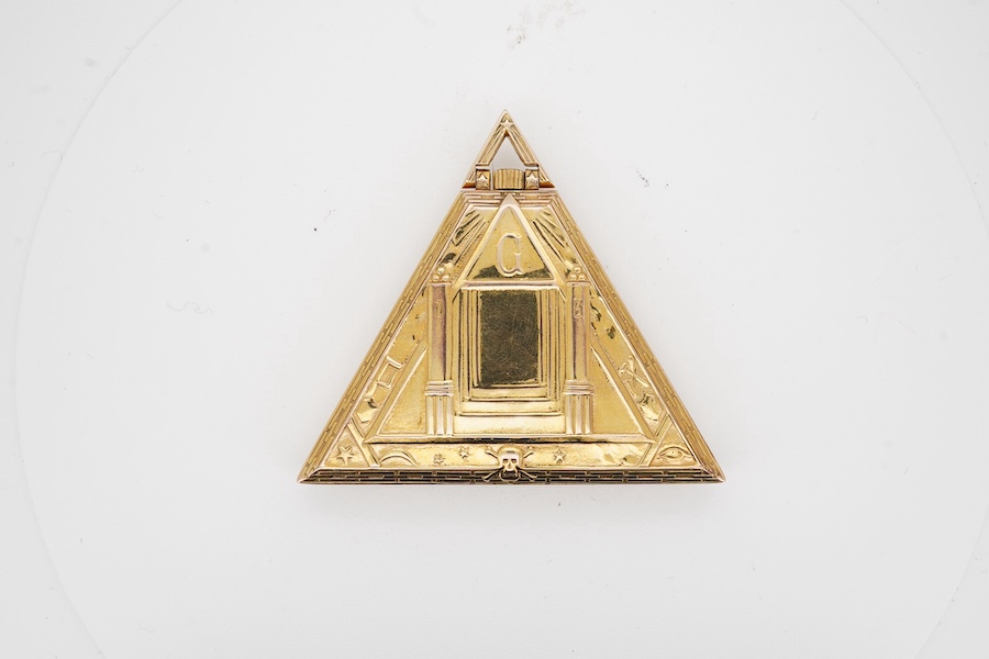A cased gold plated Minimax Masonic triangular pocket watch, with symbol 'numerals', 48mm by 55mm. Condition - poor to fair